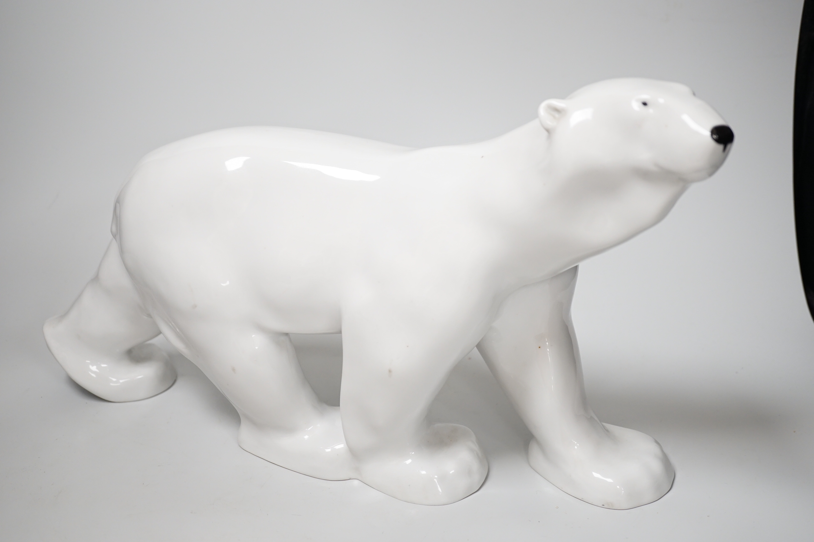 A USSR ceramic leopard and polar bear, latter 25cm high